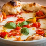 A colorful Cottage Cheese Pizza Bowl topped with mozzarella, bell peppers, cherry tomatoes, and basil on a rustic table.